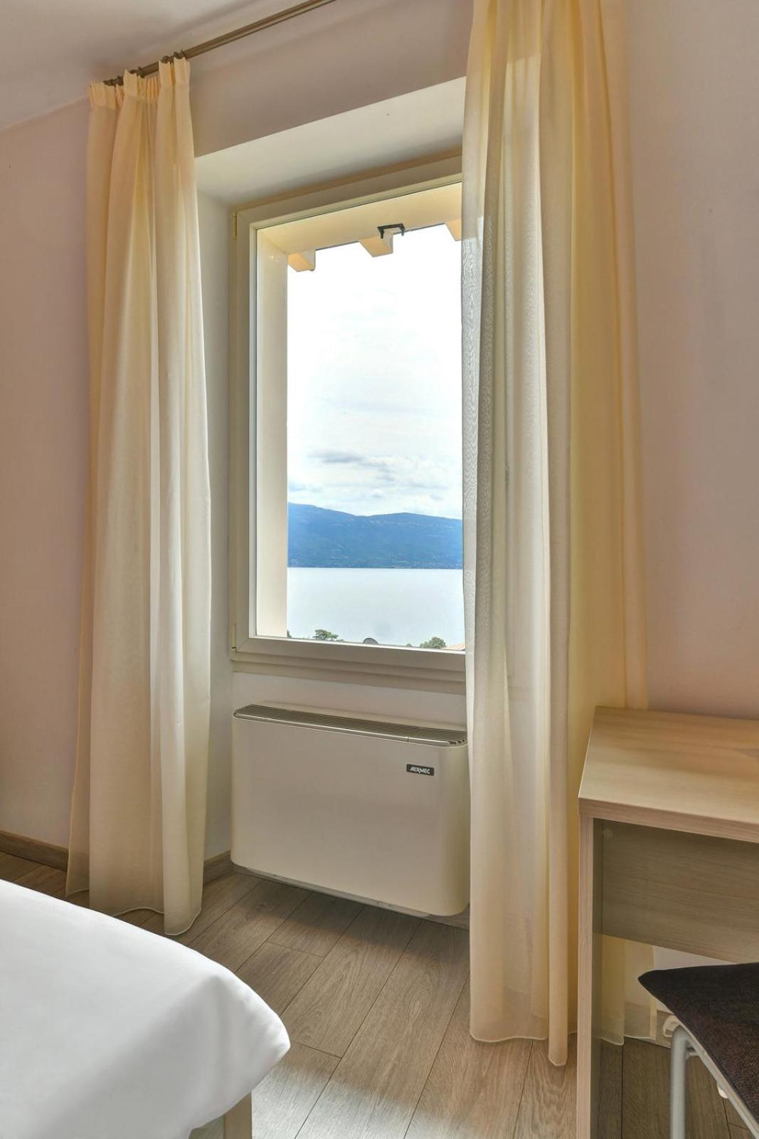 Il Sogno Sul Lago Гарньяно Экстерьер фото